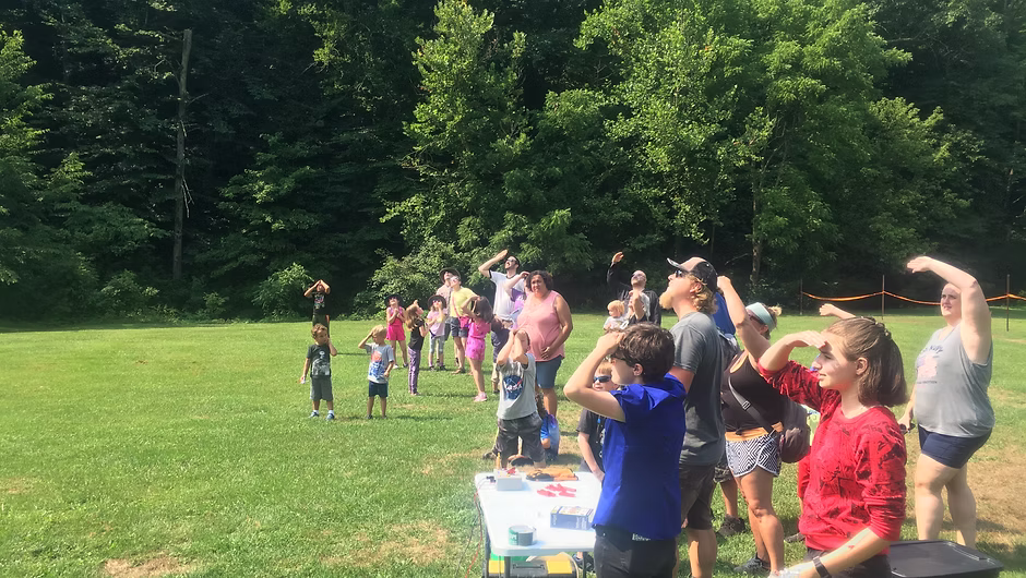 A rocket lifting off at a club event